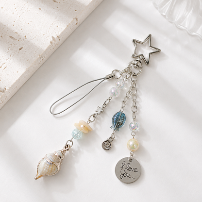 Gold-Edged Conch Shell Charm