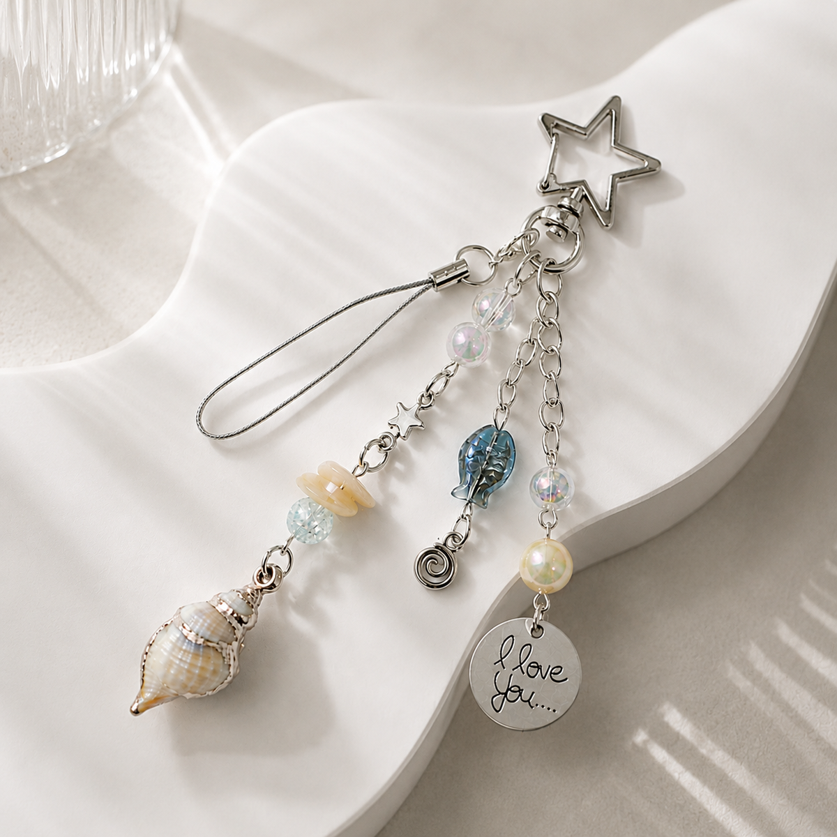 Gold-Edged Conch Shell Charm