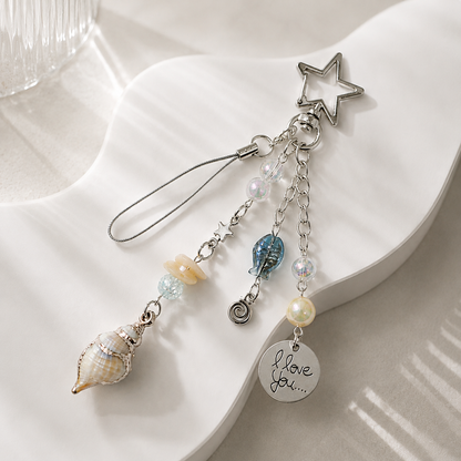 Gold-Edged Conch Shell Charm